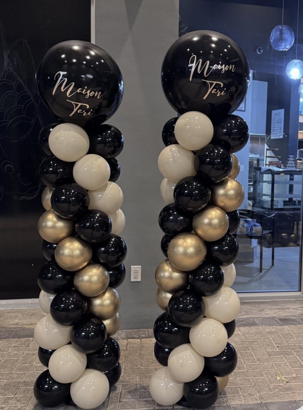 Logo Balloon Columns in Black & Gold